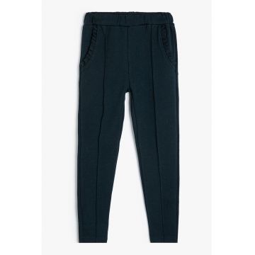 Pantaloni de trening cu buzunare oblice