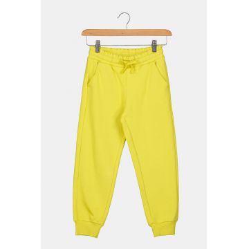 Pantaloni sport cu croiala conica si buzunare oblice