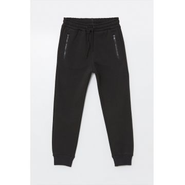 Pantaloni de trening cu buzunare cu fermoar