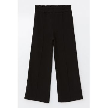 Pantaloni de trening cu croiala ampla si talie elastica