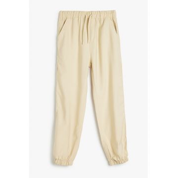 Pantaloni de trening cu buzunare laterale