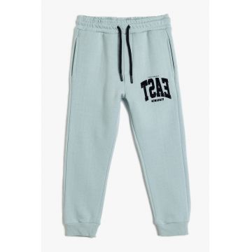 Pantaloni de trening cu buzunare laterale