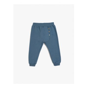 Pantaloni de trening cu nasturi decorativi