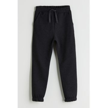 Pantaloni uni cu buzunare Pantaloni uni cu buzunare